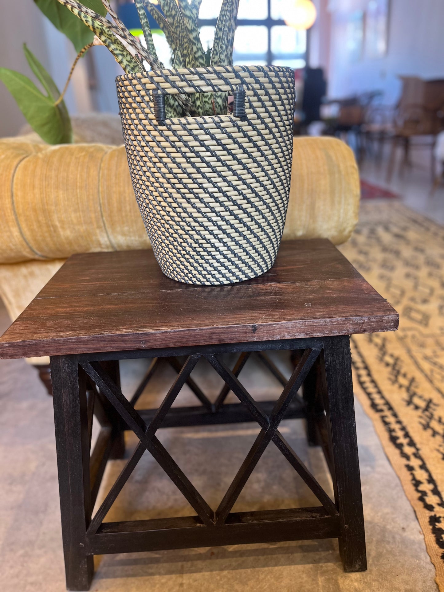 Pair of ebony side tables