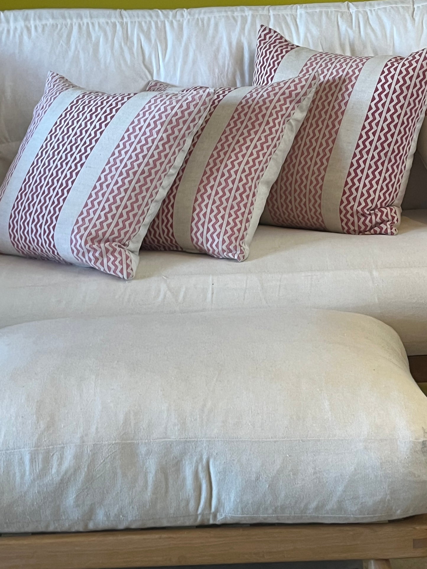 Linen cushions with pink zig-zag pattern