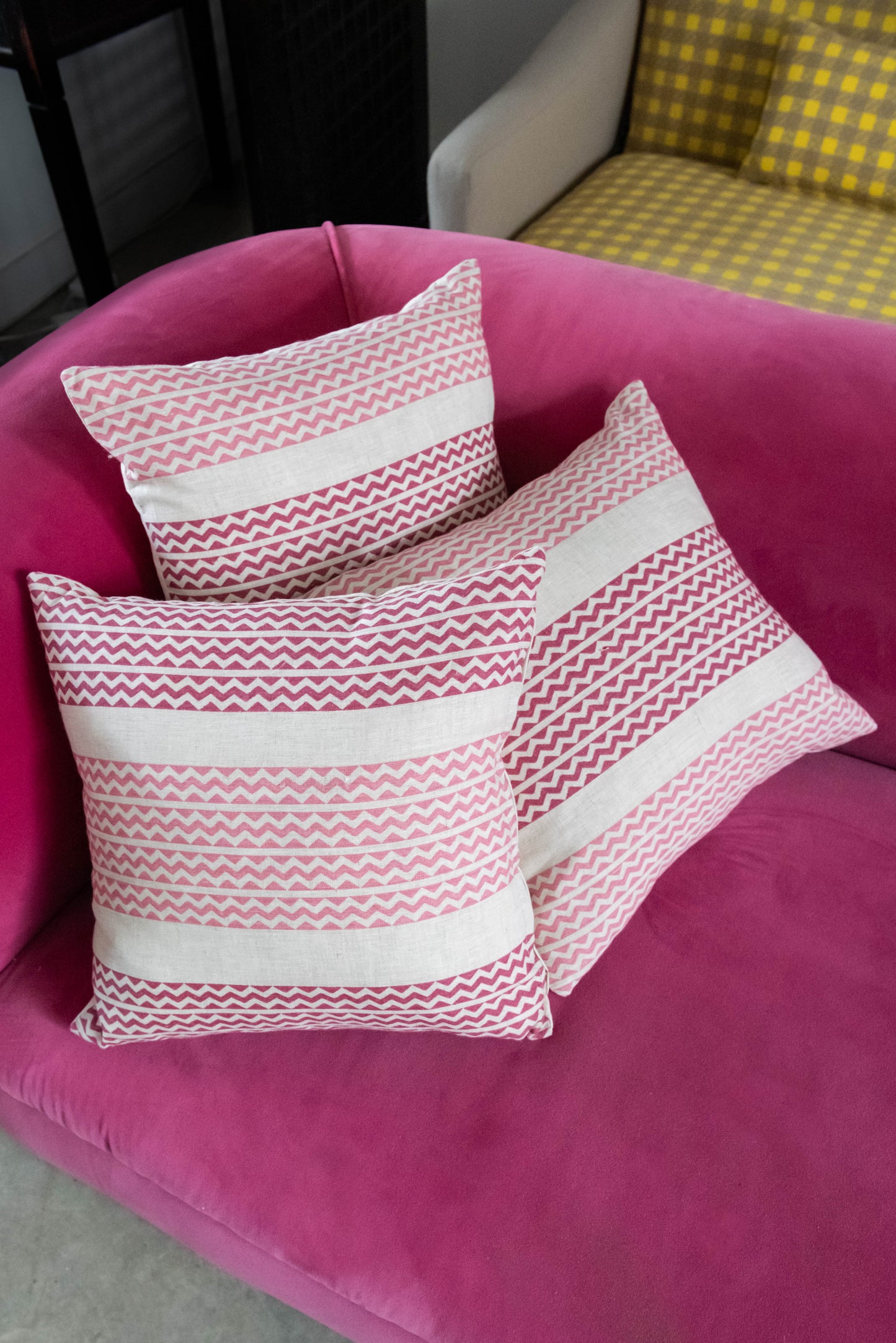 Linen cushions with pink zig-zag pattern