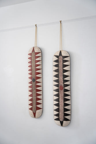 A pair of ceremonial fang shields from Gabon