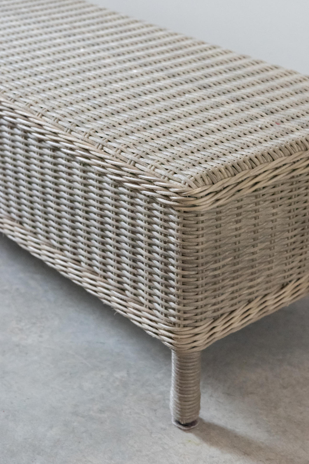 Grey wicker bench and waterproof cushion